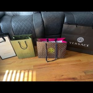 2 gucci 1 Versace 2 Jimmy Choo 2 Tory Burch papers bags